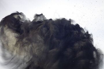 After the initial kinetic energy is consumed, the ash is taken by wind turbulence, creating curling veils of black. (Photo: Tom Pfeiffer)