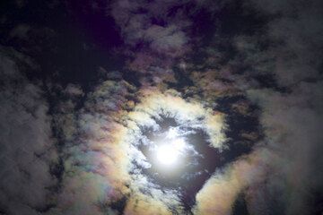 The remnants of the rain cloud in the sky create a nice halo arond the moon at night. (Photo: Tom Pfeiffer)