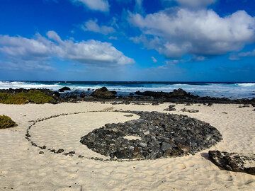 Le symbole de l'harmonie sur la plage blanche. (Photo: Tobias Schorr)