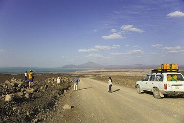 The goal of today is (almost reached!) - a large salt lake, Lake Afrera, at -120 m a.s.l., occupies the southern part of the Danakil. Salt is being quarried here in large salines at the shores of the lake.  (Photo: Tom Pfeiffer)