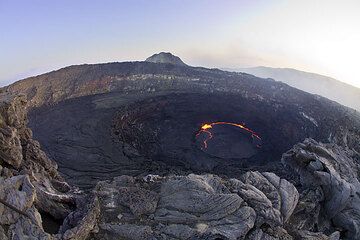 The active lava lake, about 75 m in diameter, is inside the north pit crater. (Photo: Tom Pfeiffer)