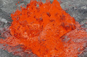 Lava bubble erupting at the Erta Ale lava lake, Ethiopia (Photo: Tom Pfeiffer)