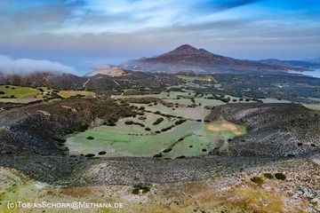 One of the craters of Tsingrado caldera and in the background the huge lavadome Profitis Ilias. (Photo: Tobias Schorr)