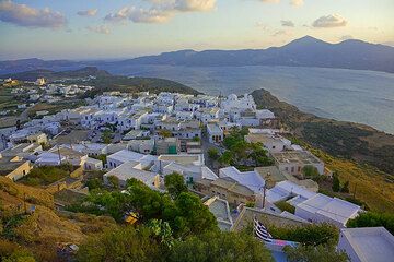 The present-day capital Plaka (after Zefiria was abandoned in the 18th century) is a picturesque, tranquil Cycladic village at the foot of the ancient Acropolis and Medieval castle, sitting on the top of an old dacite lava dome.  (Photo: Tom Pfeiffer)