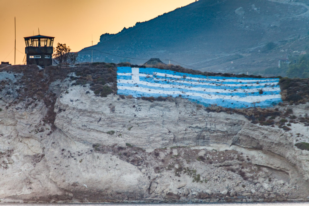 A Greek flag to show the nationality of the area to the Turkish people opposite of Kos island. (Photo: Tobias Schorr)