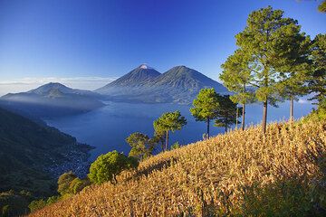 The caldera of Laka Atitlán, Guatemala, in the morning. San Pedro, Atitlán and Toliman volcanoes in the background.  (Photo: Tom Pfeiffer)