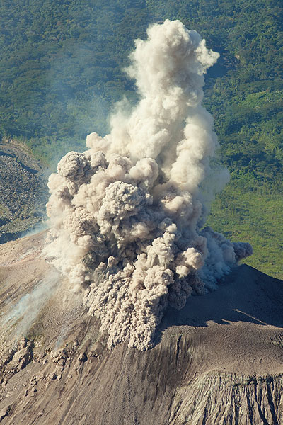 Photo of the Day: A stronger burst of ash creates small pyroclastic flows on the upper slope of the cone.