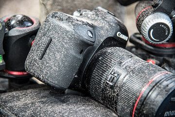 ... and soon feel the effects of ash fall on our gear. (Photo: Tom Pfeiffer)