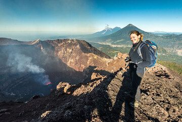Happy Ingrid on the rim of Mackenney crater of Pacaya, where a new cinder cone is growing. (Photo: Tom Pfeiffer)