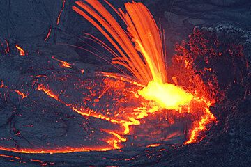Lava spattering from a vent feeding a lava lake. (Photo: Tom Pfeiffer)