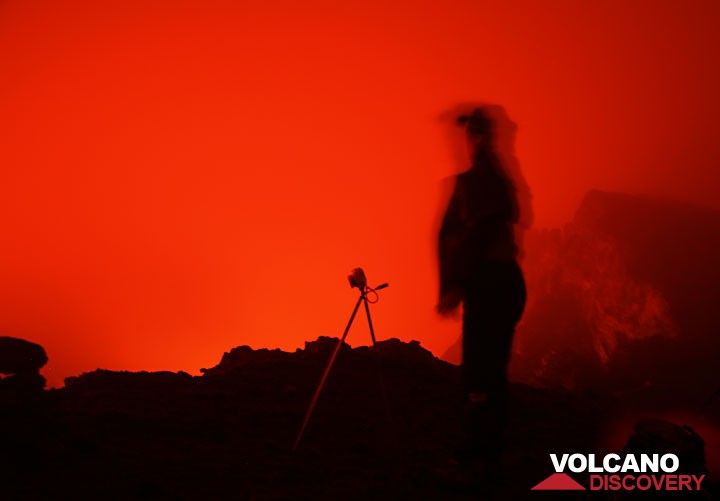 Watching a lava lake in Pu'u 'O'o crater, Kilauea volcano, Hawaii (c)