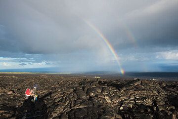 Rainbow over the vast lava flow field. (Photo: Tom Pfeiffer)