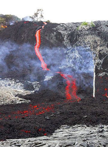 The leading edge of an 'a'a lava flow descends Pulama Pali, being fed from the Peace Day Fissure on Pu'u 'O'o vent on K?lauea volcano on December 4, 2011. (Photo: Philip Ong)