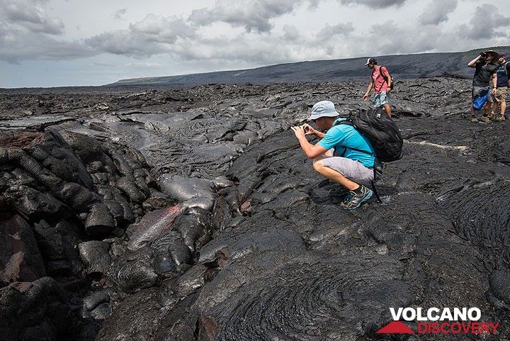 Hikers enjoy getting personal with real, red hot lava! (Photo: Tom Pfeiffer)