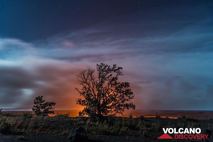 A single ohia tree silhouetted against the lava lake inside Halema'uma'u crater. (Photo: Tom Pfeiffer)