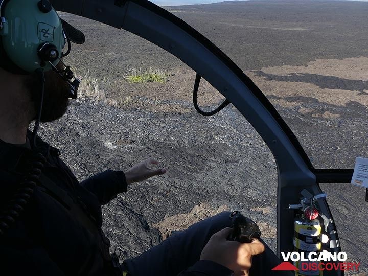 Extension day 3: Flying over the lava fields our pilot tries to spot the freshest silvery coloured lava flows in the hopes of seeing some fresh overland breakouts (Photo: Ingrid Smet)