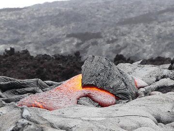 A small lava breakout pushes up its crust - note the heat shimmer in the air above it (Photo: Ingrid Smet)