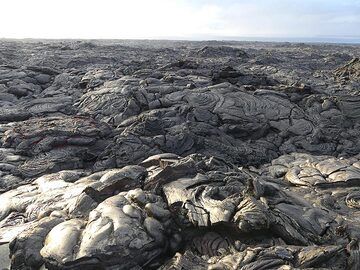 Silvery crust has formed in this area of the young flow. (Photo: Ingrid Smet)