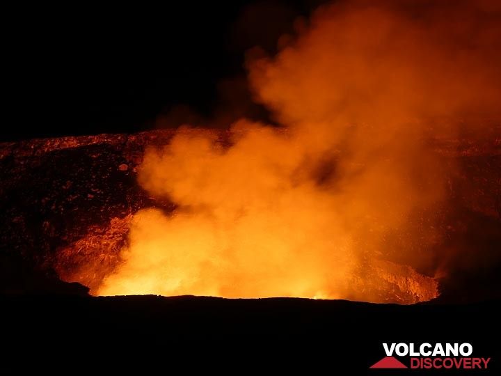 At times the entire Halema'uma'a crater is filled with volcanic gasses such as steam and sulphur dioxide, reflecting the surface of the lava lake in bright yellow, orange and red (Photo: Ingrid Smet)