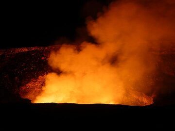 At times the entire Halema'uma'a crater is filled with volcanic gasses such as steam and sulphur dioxide, reflecting the surface of the lava lake in bright yellow, orange and red (Photo: Ingrid Smet)