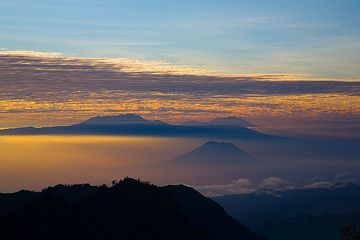 Morning sky and view across Argopuro volcano to the Ijen massif (c)