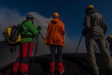 Observing Dukono's activity from the crater rim. (Photo: Tom Pfeiffer)