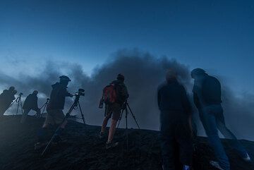 Dawn on the crater rim of Dukono volcano (Halmahera, Indonesia) (Photo: Tom Pfeiffer)