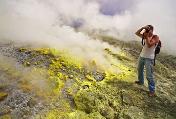 Markus taking photos inside the crater of Papadayan volcano (Photo: Tobias Schorr)