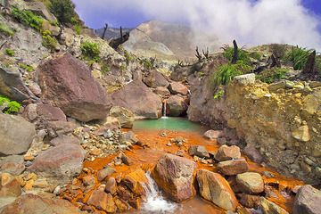 A acid creek inside the crater valley of Papadayan volcano (Photo: Tobias Schorr)