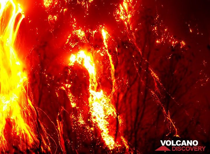 Glowing lava avalanches from the active lava dome of Kelud volcano (East Java, Indonesia) during its Nov 2007 eruption. (c)