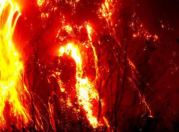 Glowing lava avalanches from the active lava dome of Kelud volcano (East Java, Indonesia) during its Nov 2007 eruption. (c)