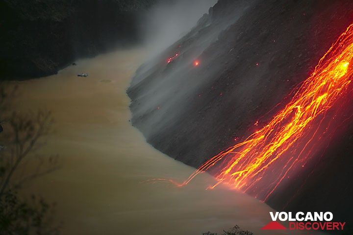 Glowing rockfalls from the active lava dome of Kelut volcano, East Java, during its 2007 eruption. (c)