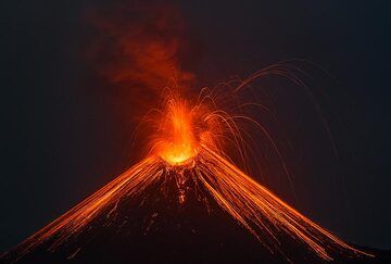 Small vulcanian explosion seen from Rakata (night 20-21 Nov) (Photo: Tom Pfeiffer)