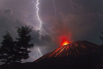 Lightning strikes on the erupting volcano. The situation is quite uncomfortable... (c)