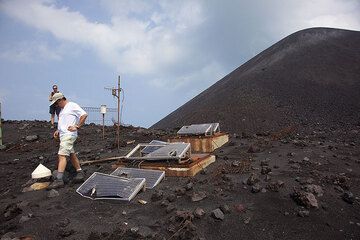 The seismic station on the old crater rim has suffered a lot of impacts during the eruption (Photo: Tom Pfeiffer)