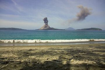 A powerful vulcanian explosion of Anak Krakatau seen from opposite Rakata Island. (Photo: Tom Pfeiffer)