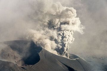 Raung volcano, East Java, Indonesia: The new cinder cone has two main vents; the smaller to the SW was producing intermittent, and sometimes continuous ash jets. (Photo: Tom Pfeiffer)