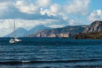 The twin volcanoes of Salina Island in the background, seen from Porto Ponente, Vulcano (Photo: Tom Pfeiffer)