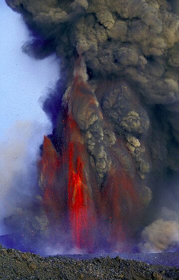 The activity at the 2500 m vent reaches a peak in violence on July 24. A pulsating, ash-rich lava fountain reaches several 100 m height and ash is raining down in Catania, where the airport is shut down.  (Photo: Tom Pfeiffer)