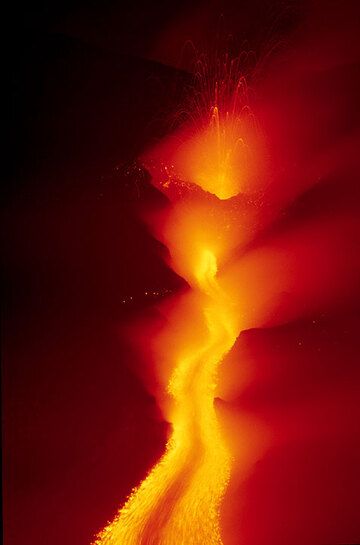 The lava flow and spattering at the 2100 m vent at night. (c)