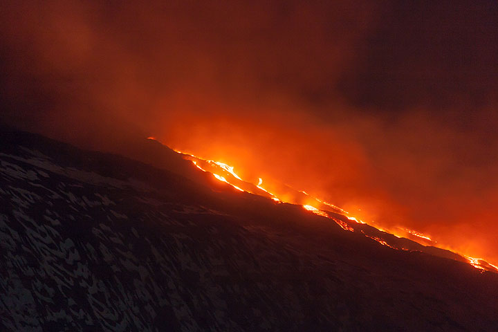 View of the lava flow from NSEC on the evening of 8 Feb 2014. (Photo: Tom Pfeiffer)