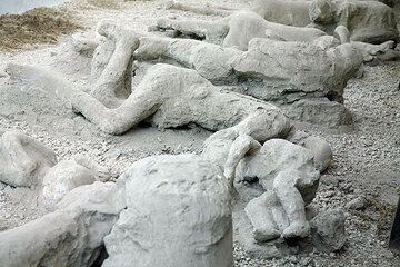 Plaster casts of the hollows left by bodies of victims found in place in the ruins. When Vesuivus erupted in 79 AD, many inhabitants took a fatal decision to stay in the city, trying to cope with the initial constant fall of pumice. When the first pyroclastic flows invaded the city, the remaining survivors were killed, probably more or less instantly. Their bodies were incorporated into the thick ash and pumice deposits and left hollows when the organic material decomposed away. (Photo: Tom Pfeiffer)