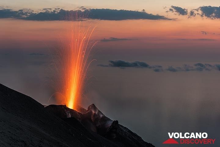 Small candle-shaped eruption from the eastern crater at dusk (11 June 2017). (Photo: Tom Pfeiffer)