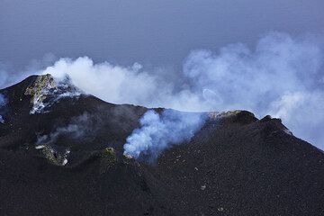 A "smoke ring" (gas ring) expelled from the puffing central crater hornito. (Photo: Tom Pfeiffer)