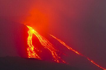 During January 2013, Stromboli produced frequent small and a few larger short-lived lava flows from the breached NE crater which reached about half way down the Sciara del Fuoco. The following photos show the activity between 7-15 Jan. (Photo: Tom Pfeiffer)