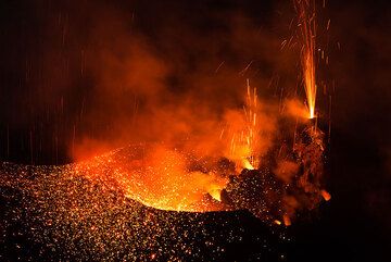 The western crater and spattering from two vents (Photo: Tom Pfeiffer)