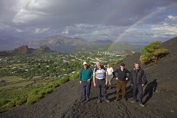 A beautiful rainbow behind us over Vulcanello. Lipari island in the background, as well as Panarea and Stromboli islands. (Photo: Tom Pfeiffer)