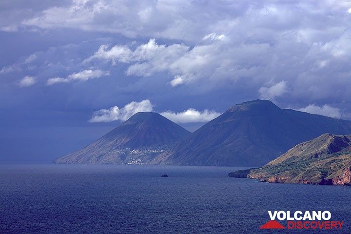 Salina's volcanoes Monte dei Porri and Monte Fossa delle Felci in the background against the approaching storm front.  (Photo: Tom Pfeiffer)