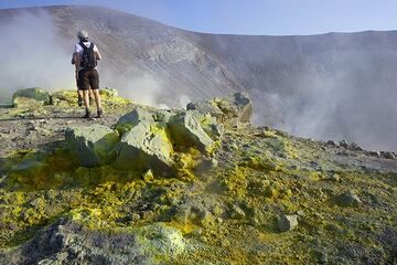2 days later, we are on Vulcano Island, and explore the fascinating crater with its very active yellow fumaroles and sulphur deposits on the rim. (Photo: Tom Pfeiffer)