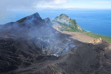 View over the crater of Mt Ontake volcano on Suwanose-jima; Nakano-jima island in the background to the NE. (Photo: Tom Pfeiffer)